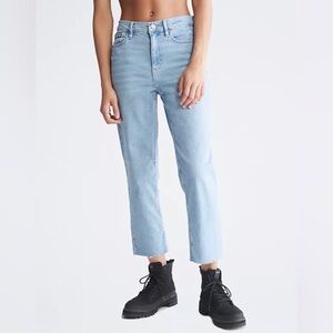 Calvin Klein | Women’s light blue high rise straight leg raw hem jeans, size 25